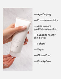 Closeup of Lotion with overlay text outlining benefits: Age Defying, promotes elasticity, aids in more youthful, supple skin, supports healthy skin barrier, softens. Vegan, gluten-free, cruelty-free.